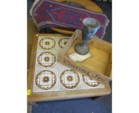 A retro tiled top square coffee table, together with a Turkish rug with certificate, a vintage wooden farming box and a Victo