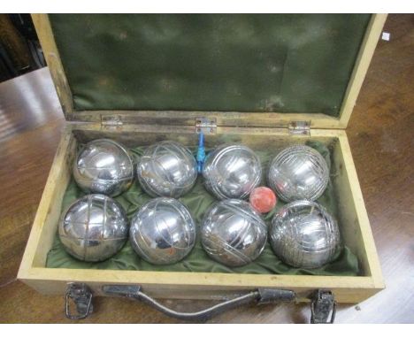 A vintage boxed Boules set 