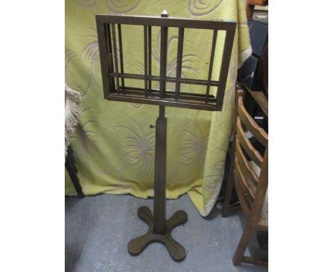 A reproduction mahogany floor standing music stand 50"h 