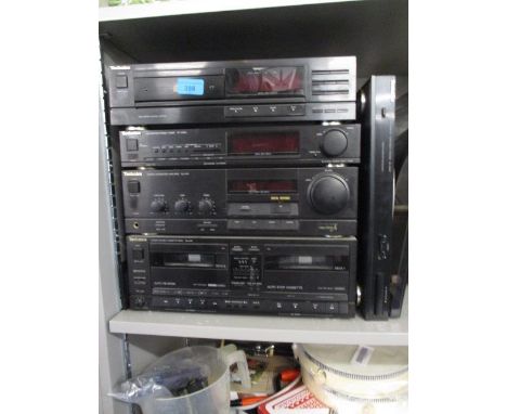 A Technics stackable stereo, tape deck, amplifier, tuner, disc player and turntable A/F 