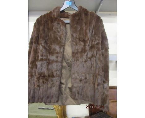 A vintage ermine fur jacket, hip length, in brown 