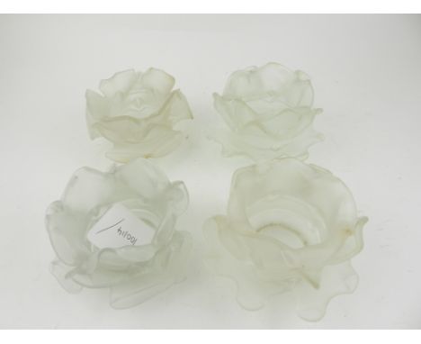 A set of four early 20th century glass lamp shades, fashioned as rose heads.