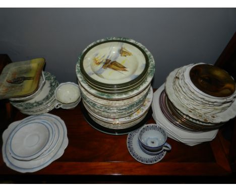 A Wedgwood Black Basalt part coffee service, to include seven cups, saucers and a sugar bowl, together with a lustered Bavari