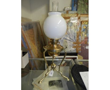 A yellow metal and glass Art Deco style paraffin table lamp, H.63cm 