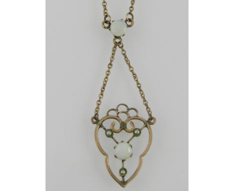 A gilt metal and opal set pendant necklace in the Art Nouveau taste. 