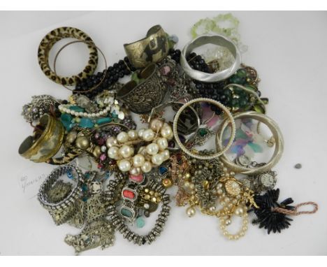 A quantity of costume bracelets, to include paste set and pearl style examples.