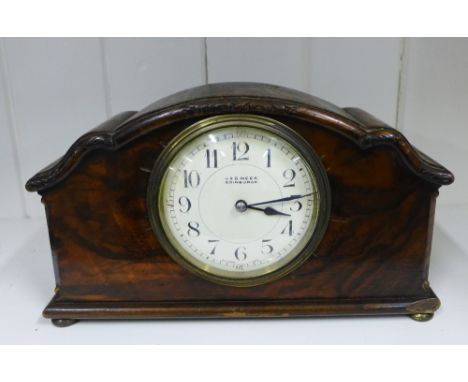 A burr wood mantle clock, the enamel dial with Arabic numerals inscribed J & D Meek, Edinburgh on brass bun feet
