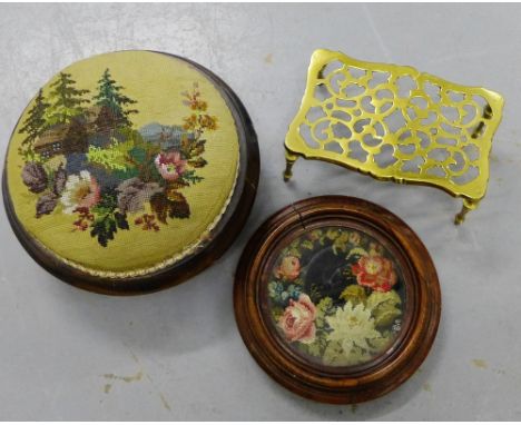 A mixed lot to include a brass trivet stand, a tapestry top footstool and a mahogany framed table stand (3) 