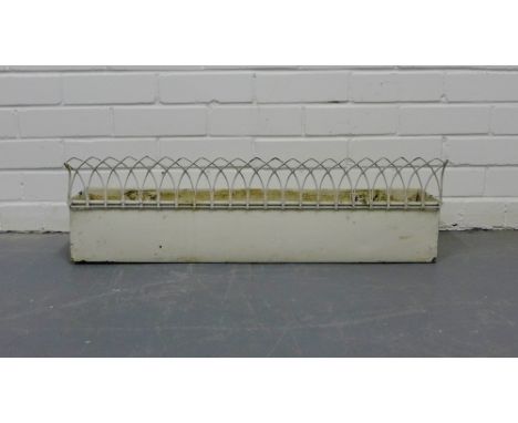 A vintage white painted iron planter of rectangular form with arched frieze to front, 75cm x 20cm 