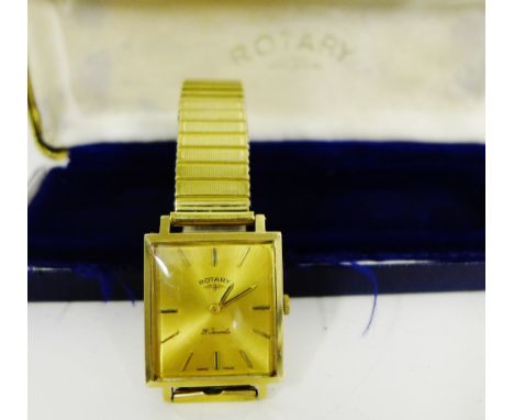 Gentleman's 9 carat gold cased Rotary wristwatch, the rectangular dial with hour batons, on expandable gold plated strap, com