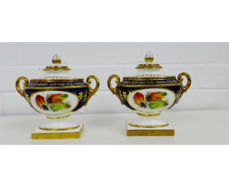 A pair of Royal Worcester Heritage Collection twin handled vases, each with a cover surmounted by a flame finial above painte