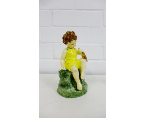 A Royal Worcester 'Friday's Child is Loving and Giving' figure, modelled by Freda Doughty, 16cm high 