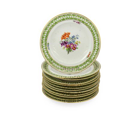 An assembled Set of Twelve Marcolini and later Meissen Porcelain Dessert Plates, late 18th century, painted with flowersprays