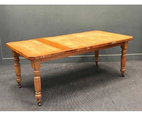 A late Victorian stripped pine kitchen dining table, 73 x 187 x 97cm