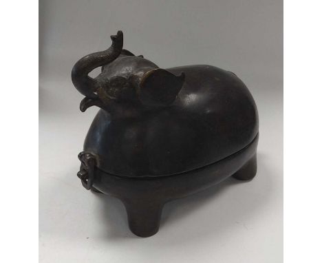 An Asian bronze box and cover as an elephant 18cm high
