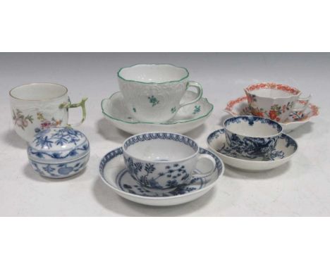 A group of Meissen to include a kakiemon style cup and saucer, a coffee cup painted with flowers, a blue and white tea cup an