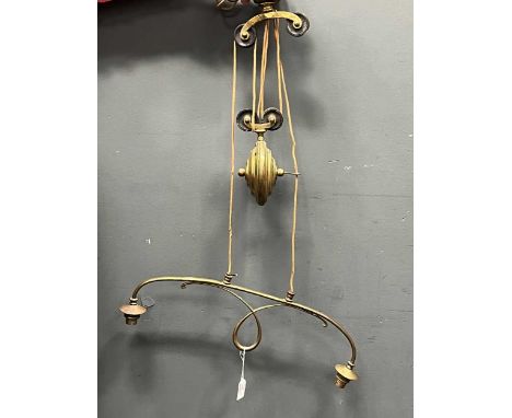 A late Victorian brass rise and fall ceiling light, stamped 'EDISWAN'54cm wide