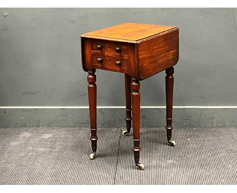 A 19th century two drawer mahogany drop flap work table on turned legs72 x 38 x 45cm closed72 x 74 x 45cm open
