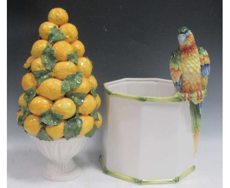 A Casa Pupo jardiniere mounted with a parrot, 41cm high; together with a Casa Pupo model of lemons in a bowl, 44cm high (2)On
