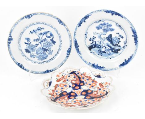 Two 18th century Chinese blue and white porcelain plates, together with a Japanese Imari plate with ridged rim, the blue and 