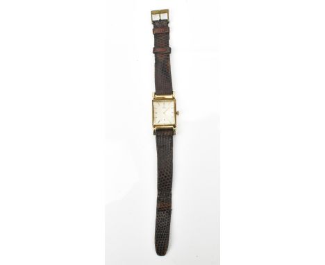 An Omega, manual wind, gents, 14ct gold wristwatch, circa 1940s, having a silvered dial, subsidiary seconds dial and baton ma