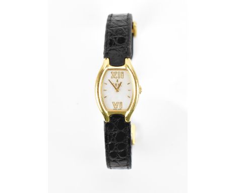 An Ebel Beluga, quartz, ladies, 18ct gold wristwatch, having a mother of pearl dial with baton markers and diamond set Roman 