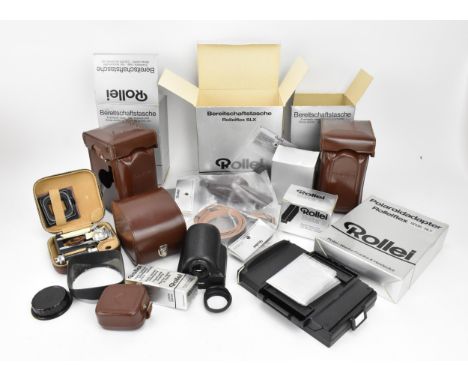A collection of Rollei photography equipment, to include a prism finder for TLR camera in leather pouch, a Rollei Beta 2 auto