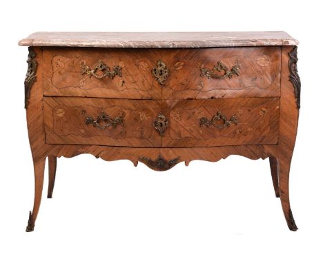 A Louis XV and later marbled topped serpentine bombe commode, with marquetry inlaid kingwood fitted two shaped drawers and or
