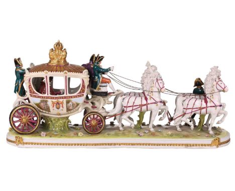 A German porcelain figure group of the marriage coach of Napoleon with footmen a team of four grey horses drawing an ornate c