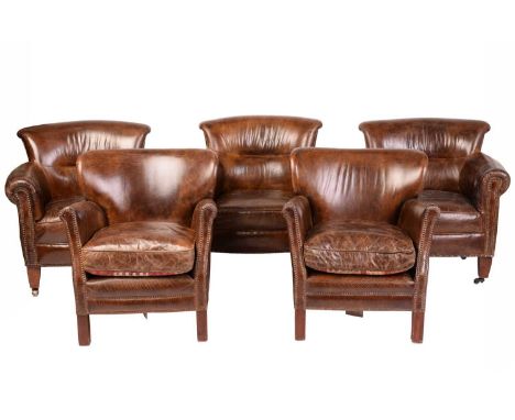 A set of three Edwardian-style distressed brown hide scroll-backed tub chairs, 20th century, with roll-over arms and square t