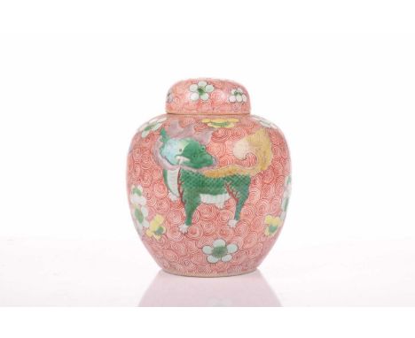 A Chinese Famile Vert porcelain ginger jar and cover, early 20th century, painted with kylin, Dragons on a ground of iron red
