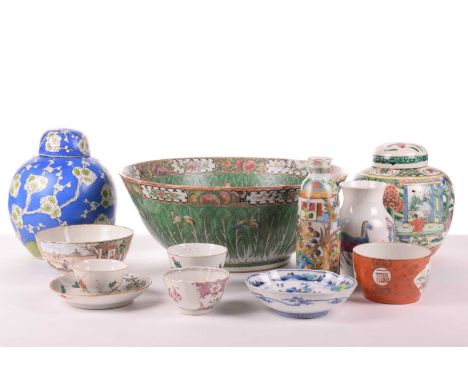 A Chinese Famille Vert porcelain ginger jar and cover, republic period or later, painted in the round with a mother breastfee