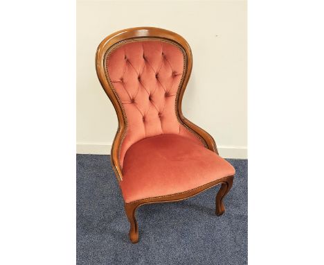 VICTORIAN STYLE SPOON BACK CHAIRthe button back above a shaped seat, with decorative stud detail, standing on cabriole front 