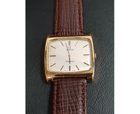 GENTLEMANS OMEGA GENEVE WRISTWATCHwith a rectangular gold plated case and champagne dial with baton markers, manual wind move