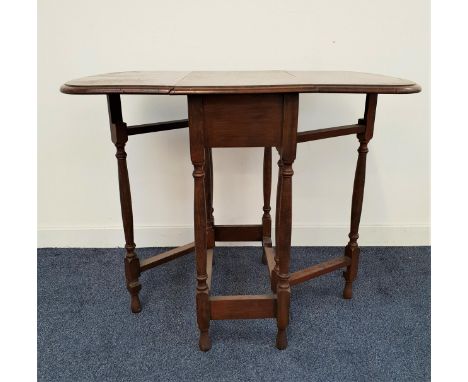 SMALL OAK GATE LEG TABLEwith shaped drop flaps, 60.5cm wide 