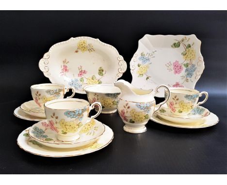 TUSCAN PLANT PATTERN TEA SETcomprising twelve cups and saucers, twelve side plates, sandwich and cake plate, milk jug and tea
