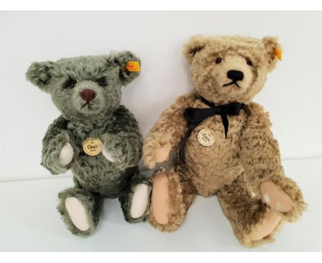 TWO STEIFF CLASSIC SERIES TEDDY BEARSin mohair, comprising a 1920 replica bear with growler, 40cm high; and a 1907 replica be