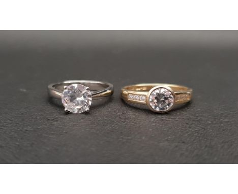 TWO CZ SET DRESS RINGSone in eighteen carat white gold, ring size N and approximately 2.8 grams; the other in fourteen carat 