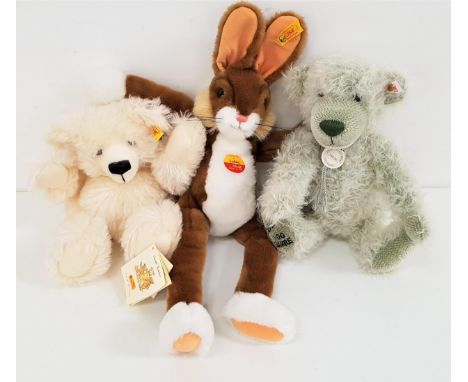 TWO STEIFF TEDDY BEARScomprising a limited edition Reinhard Schulte centenary bear, number 816 of 1500, in green mohair with 