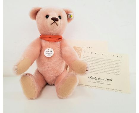 LIMITED EDITION STEIFF TEDDY BEAR 1908 REPLICAin faded pink mohair, number 1351 of 3000, with certificate, with button to ear