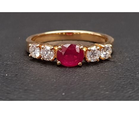 RUBY AND DIAMOND FIVE STONE RINGthe central oval cut treated ruby approximately 0.75cts, flanked by two round cut diamonds to