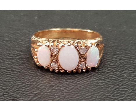 OPAL AND DIAMOND DRESS RINGthe three graduated oval cabochon opals separated by small diamonds, on unmarked gold shank, ring 