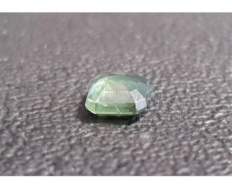 CERTIFIED LOOSE NATURAL GREEN SAPPHIREthe octagon step cut gemstone weighing 0.94cts, with ITLGR gemological report 