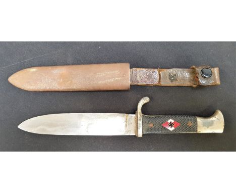 WWII GERMAN HITLER YOUTH KNIFEwith a chequered grip inset with a swastika, the 14cm long blade marked RZM M7/31 for the maker