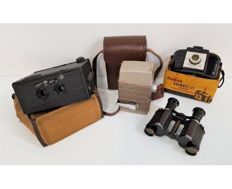 KODAK BROWNIE 127 CAMERAin original box, Bell & Howard 624 8mm cine camera and case, a Stereo Puck camera and a pair of The T