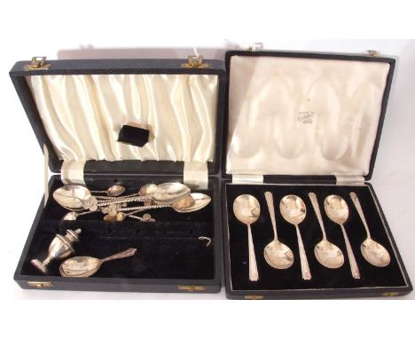 Cased set of six Elizabeth II fruit spoons in Art Deco taste with stylised handles and egg shaped bowls, Sheffield 1958 by Co