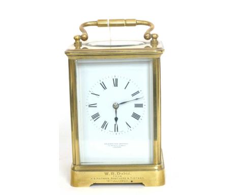 First quarter of the 20th century large French brass and glass panelled carriage clock of plain design, open escapement to th