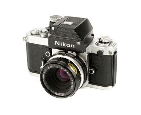 A Nikon F2 Photomic SLR Camera, 1973, chrome, serial no. 7314625, with Nikkor-.C f/2 50mm lens, black, serial no. 2304406, bo