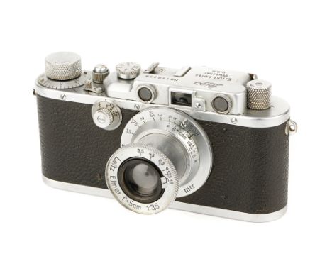 A Leica IIIc Rangefinder Camera, 1933, bright chrome, serial no. 116358, with Leitz Elmar f/3.5 50mm lens, 1938, chrome, seri