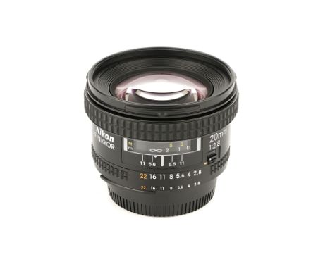 A Nikon AF Nikkor f/2.8 20mm Lens, black, serial no. 217029, body, E, elements, VG-E, some very light internal haze, with pap